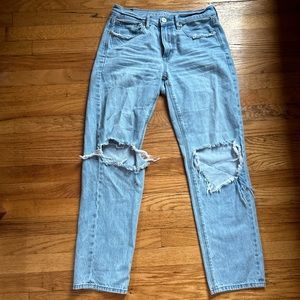 Blue low rise distressed jeans